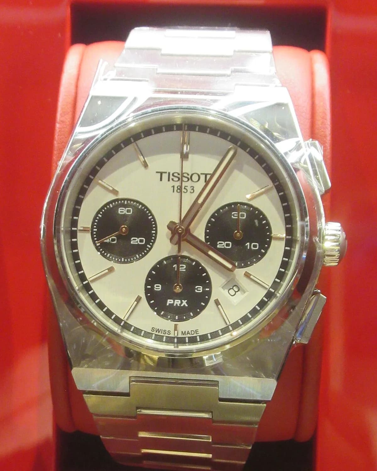 Tissot PRX — integrated bracelet with blue dial